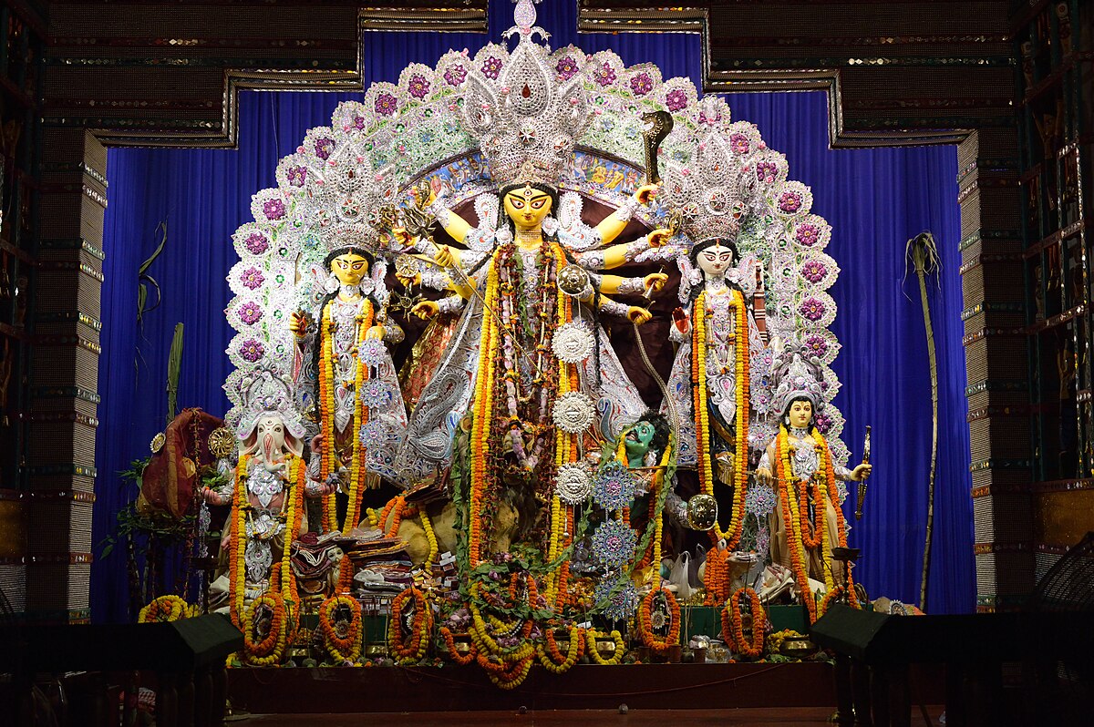 Durga idol with her family during Durga Puja celebrations
